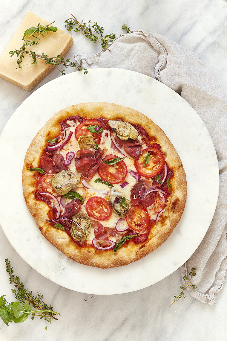Whole Prosciutto Tomato Artichoke Pizza